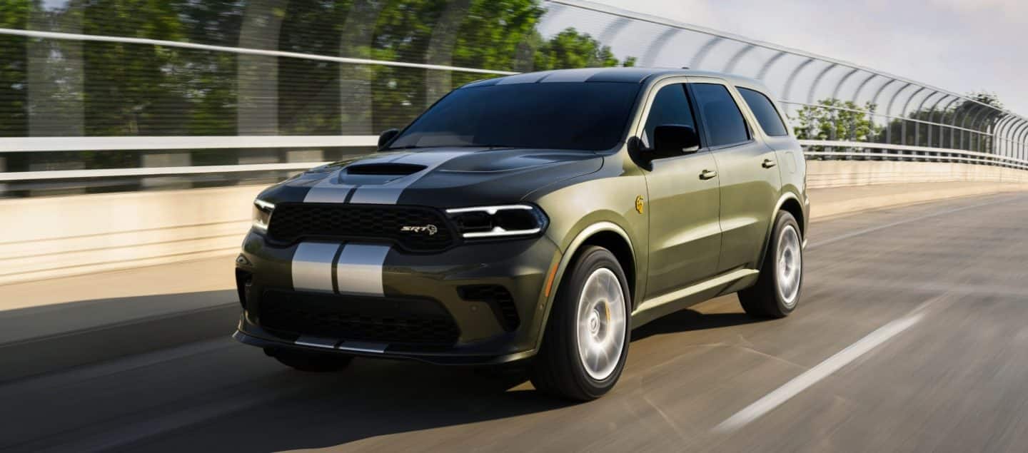 2026 Dodge Durango SUV driving on a bridge